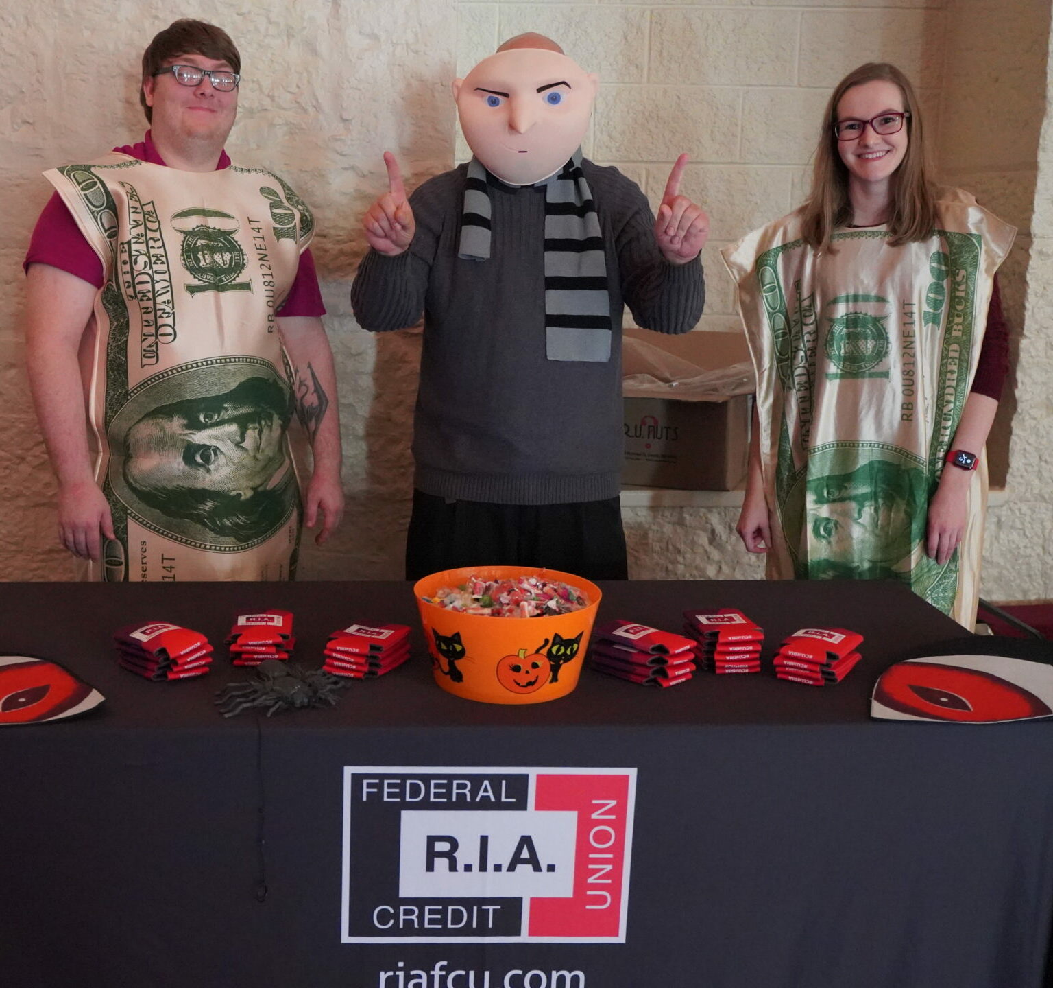 Staff handing out candy at the Arsenal